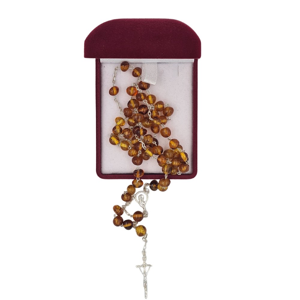 Różaniec z bursztynu bałtyckiego na srebrze – elegancja i wiara Różaniec z bursztynu bałtyckiego na srebrze – elegancja i wiara